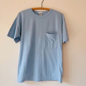 Vintage 90’s men’s‎ light blue pocket shirt sleeve tee size S